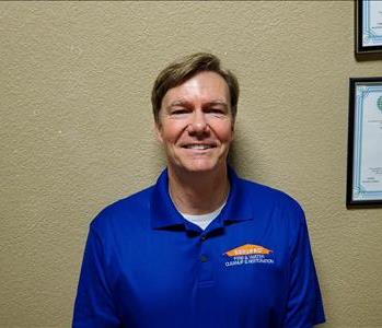 SERVPRO employee named Erik, male with light brown hair