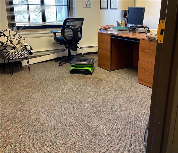 air mover in an office, desk, chair